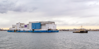 Decommissioned Vernon C. Bain Jail barge removed from Hunts Point waterfront for development